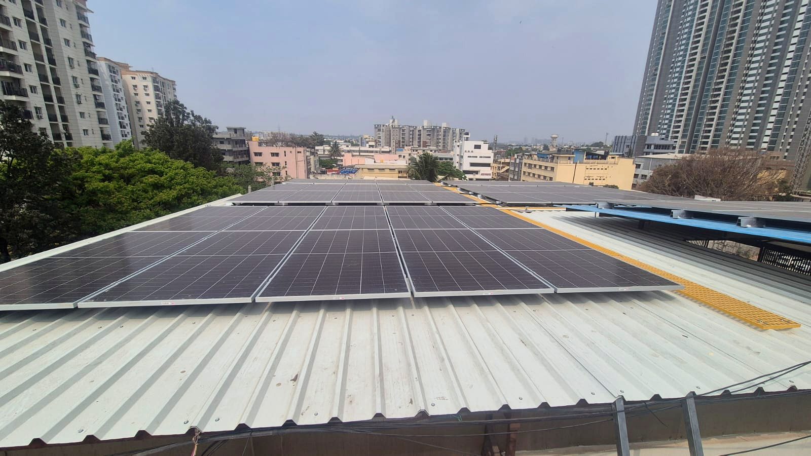 Solar panels covering a commercial warehouse rooftop