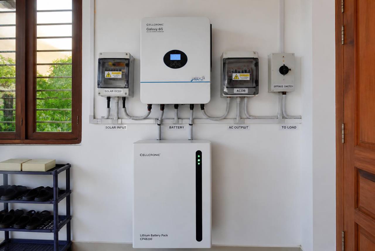 Home solar inverter with labelled DCDB and ACDB protection boxes installed in a Bengaluru house